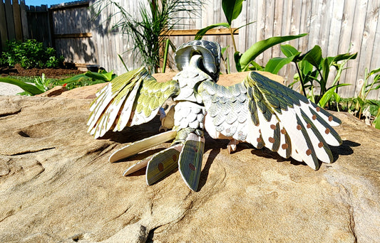 3D printed articulated Barn Owl fidget, sensory, pet toy.