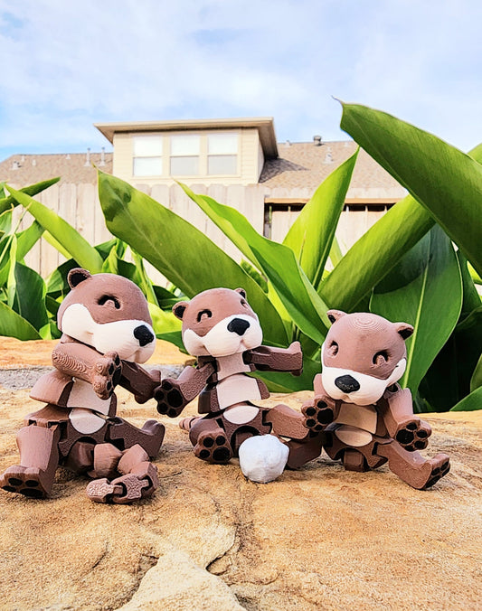 3D printed Otters articulated fidget toy.
