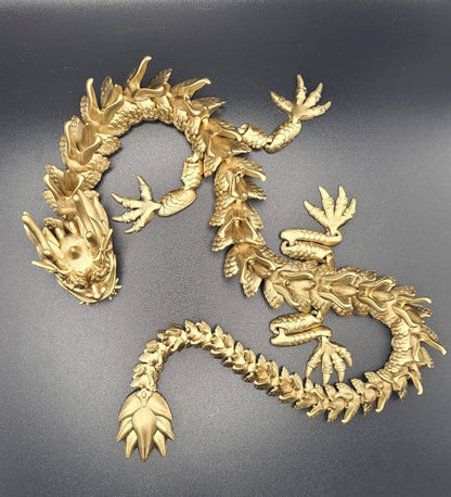 Resin 3D articulate dragon fidget toy.