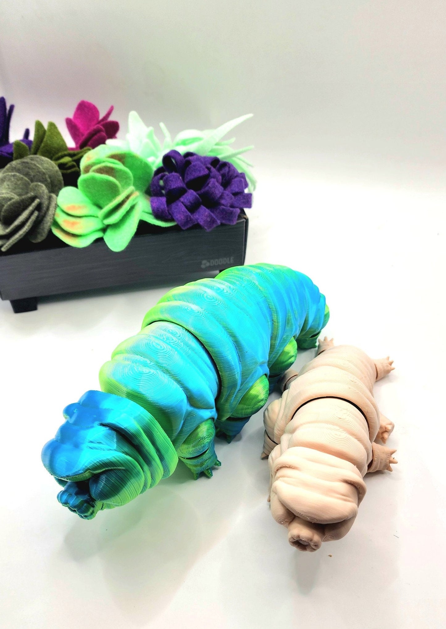 3D printed Tardigrade. Articulate fidget toy, sensory toy, desktop toy.