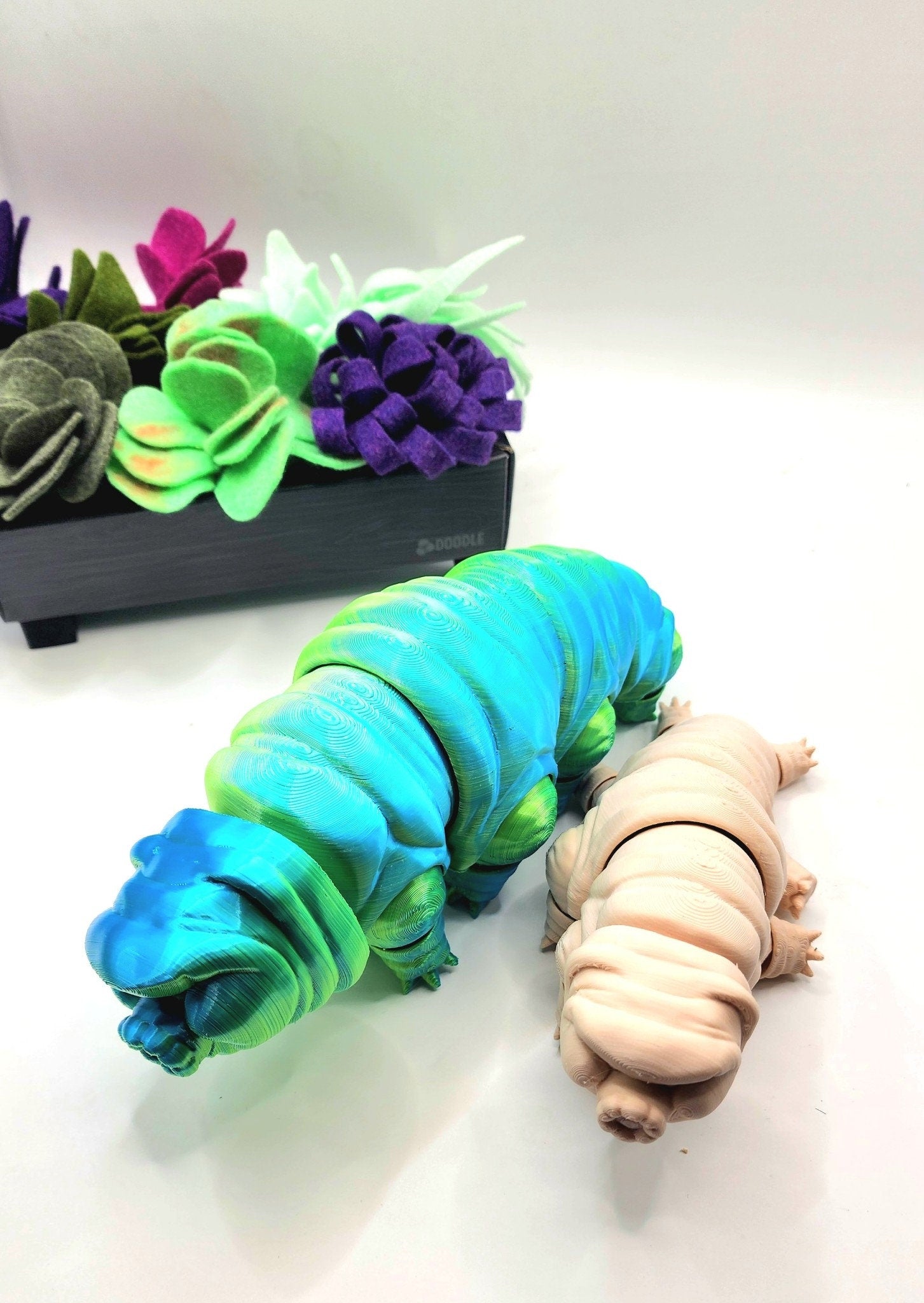 3D printed Tardigrade. Articulate fidget toy, sensory toy, desktop toy.
