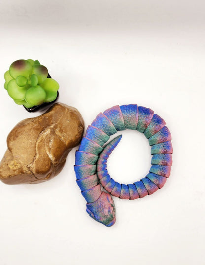 3D printed articulated hognose snake fidget toy.