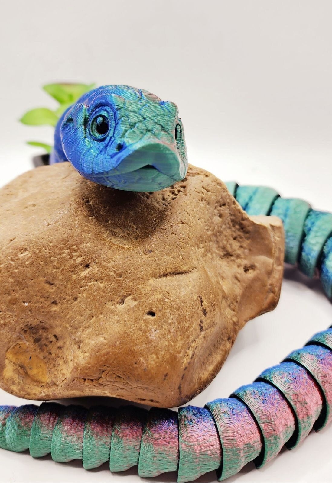 3D printed articulated hognose snake fidget toy.