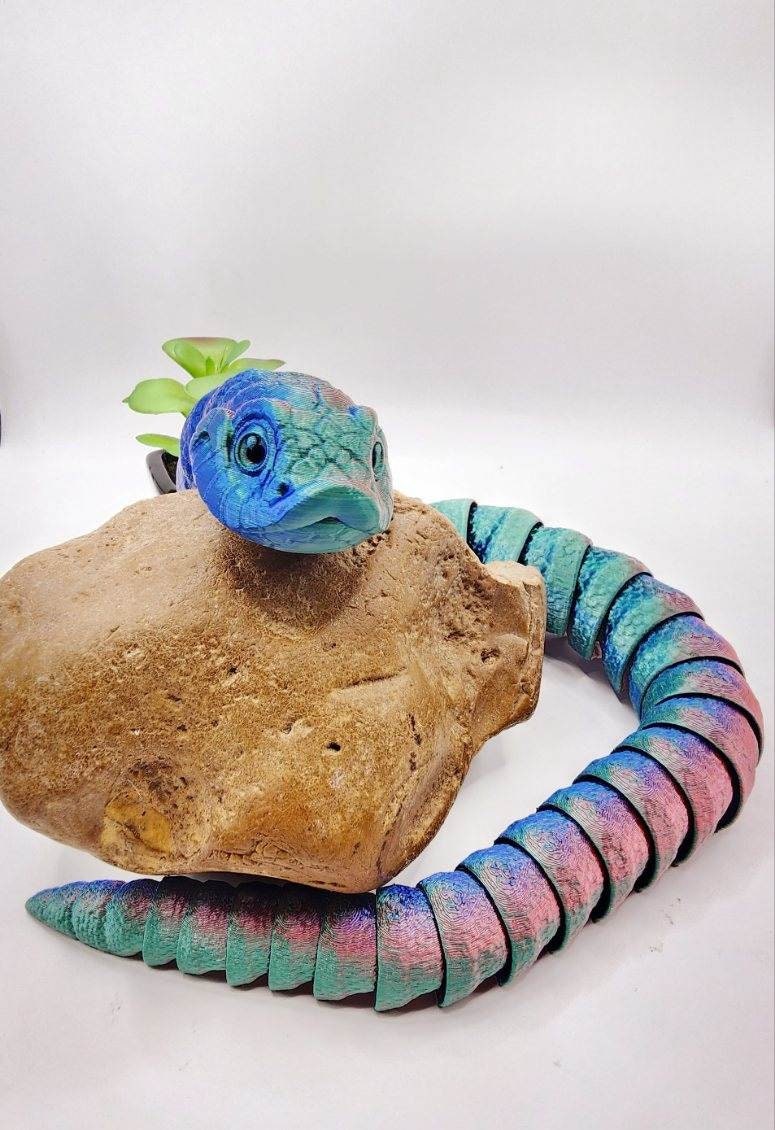 3D printed articulated hognose snake fidget toy.