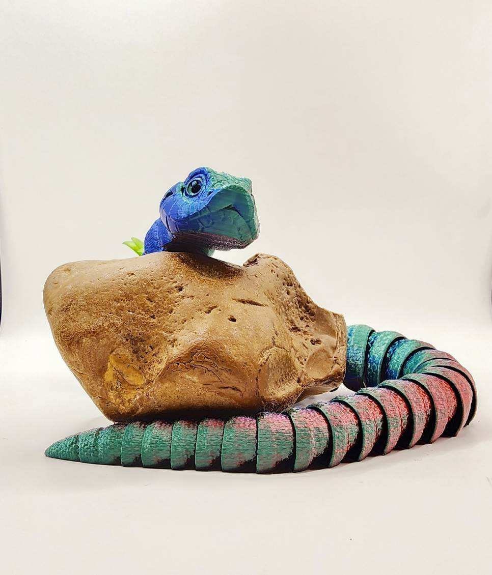 3D printed articulated hognose snake fidget toy.