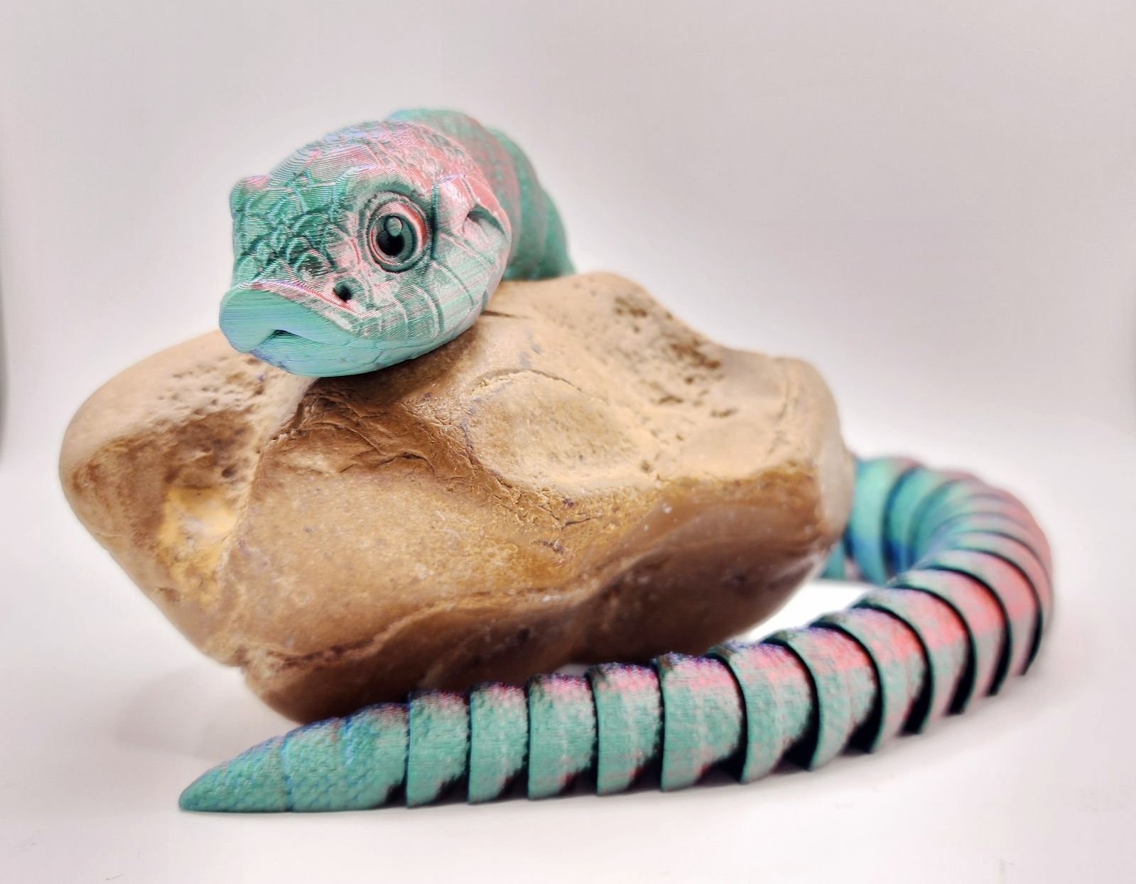 3D printed articulated hognose snake fidget toy.