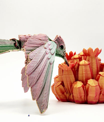 3D printed Humming Bird with a floral stand articulated fidget sensory toy. Desk Toy.