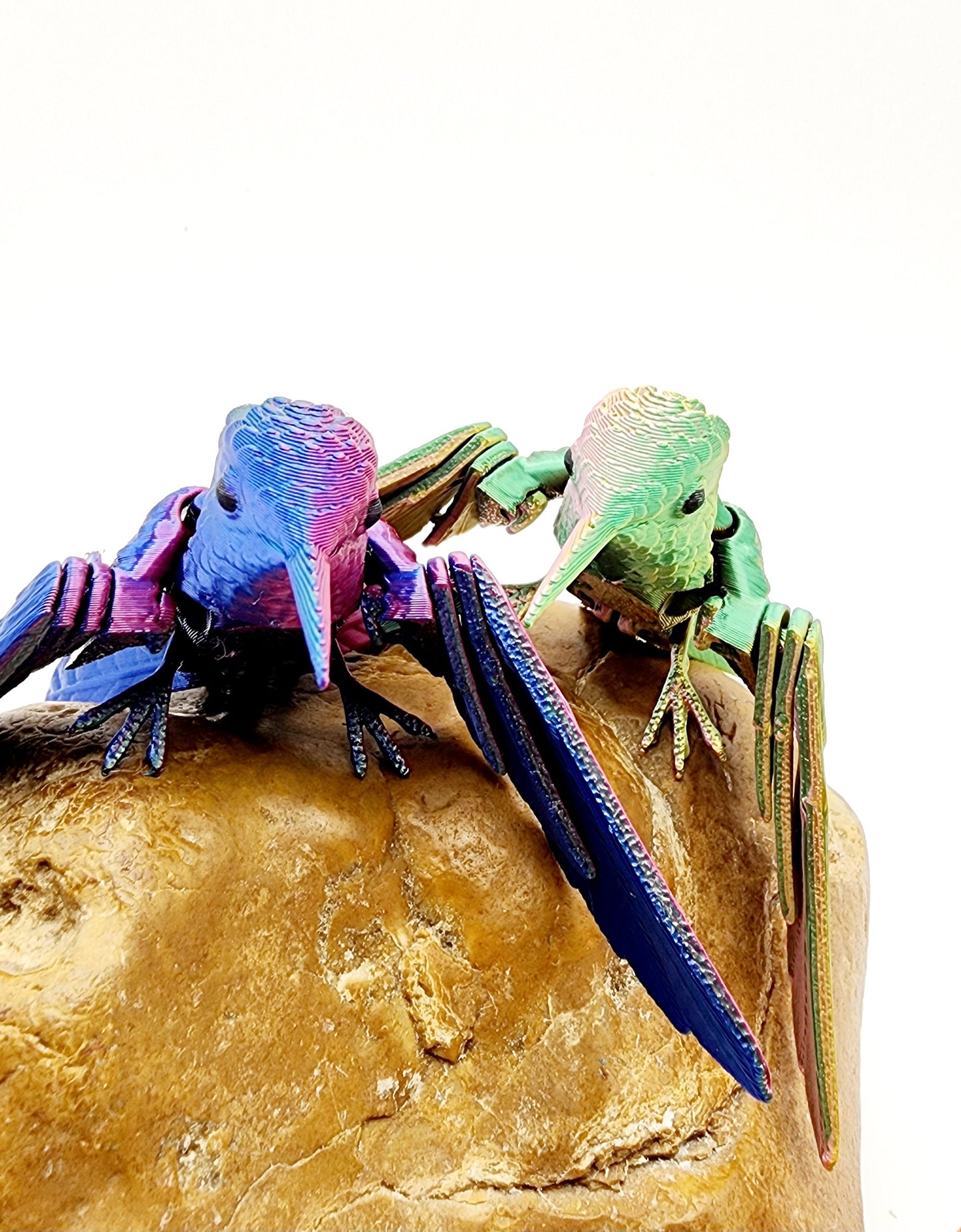 3D printed Humming Bird with a floral stand articulated fidget sensory toy. Desk Toy.