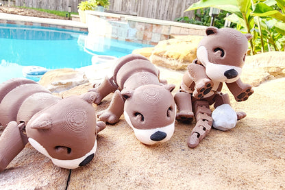 3D printed Otters articulated fidget toy.