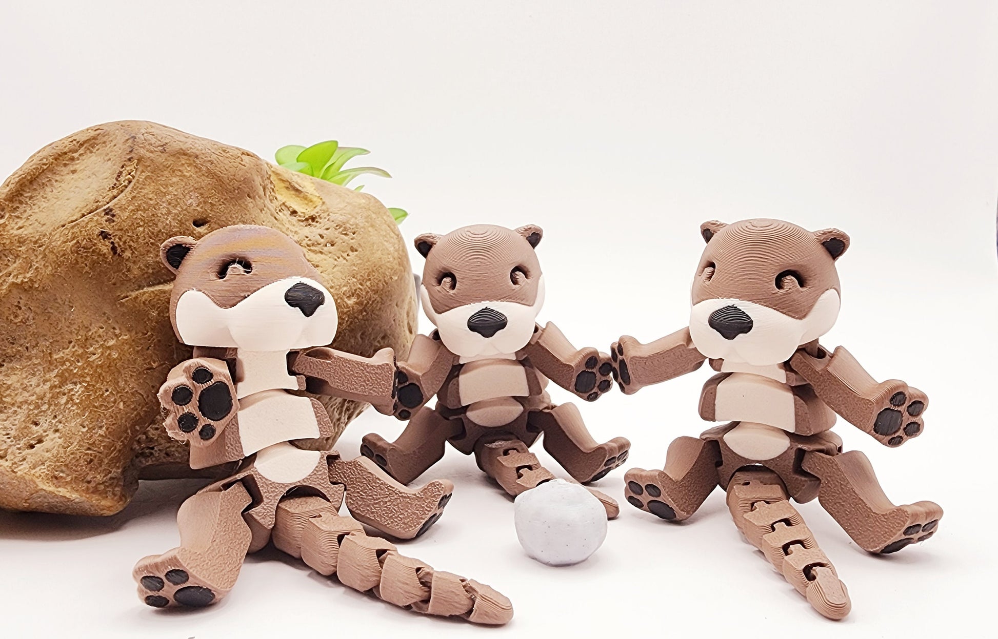 3D printed Otters articulated fidget toy.