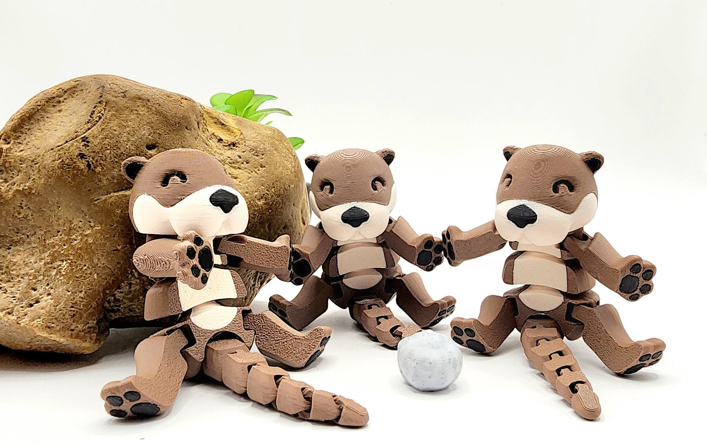 3D printed Otters articulated fidget toy.