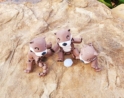 3D printed Otters articulated fidget toy.