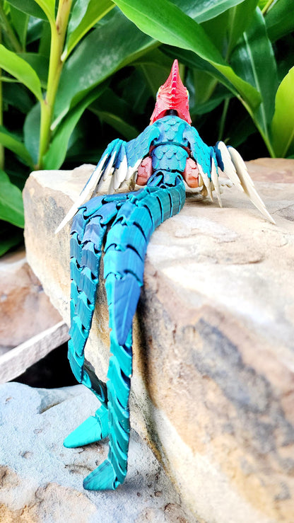 3D printed Quetzal articulated fidget, sensory toy, desk decoration.