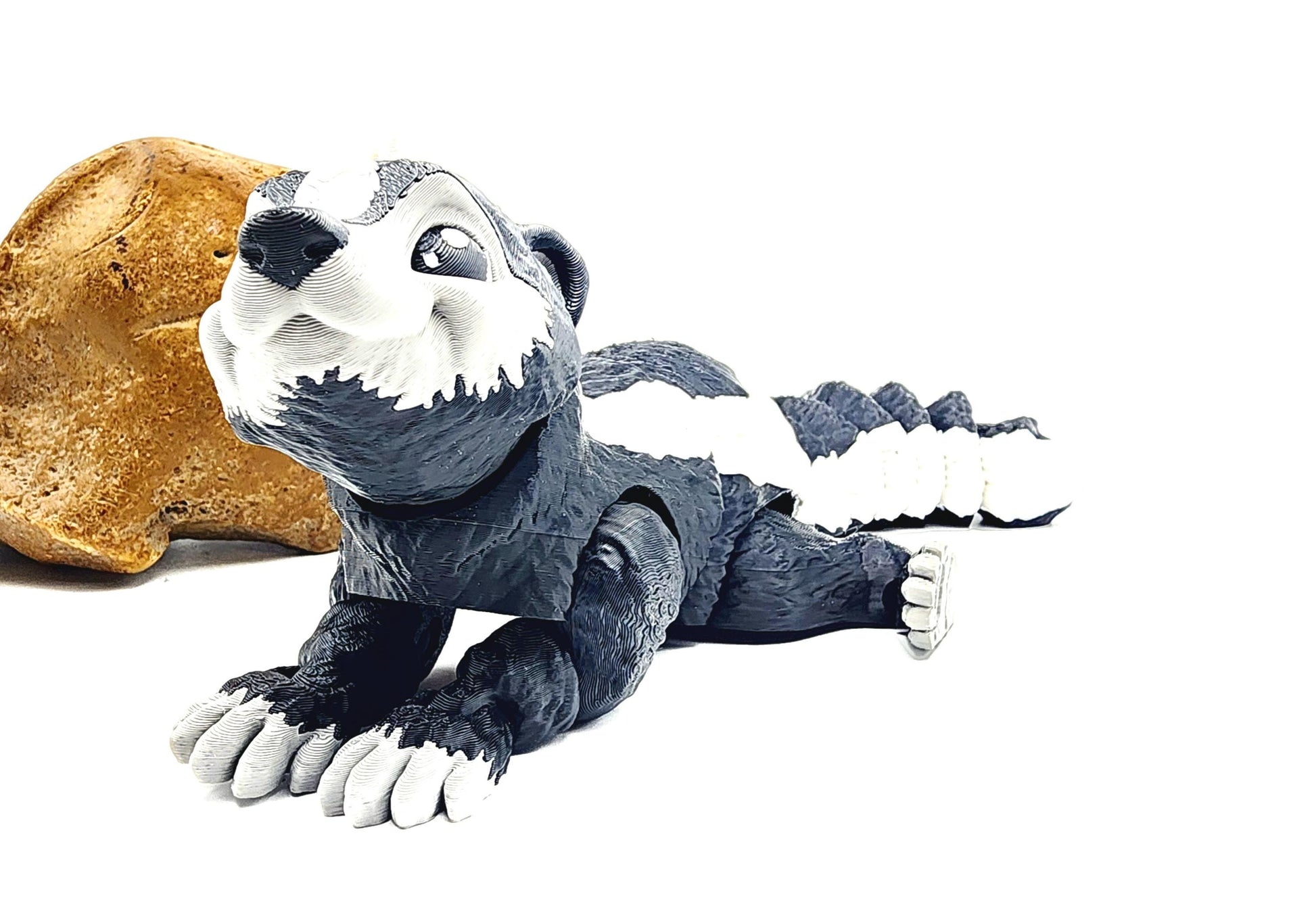 3D printed articulated Racoon fidget, sensory, desktop toy.