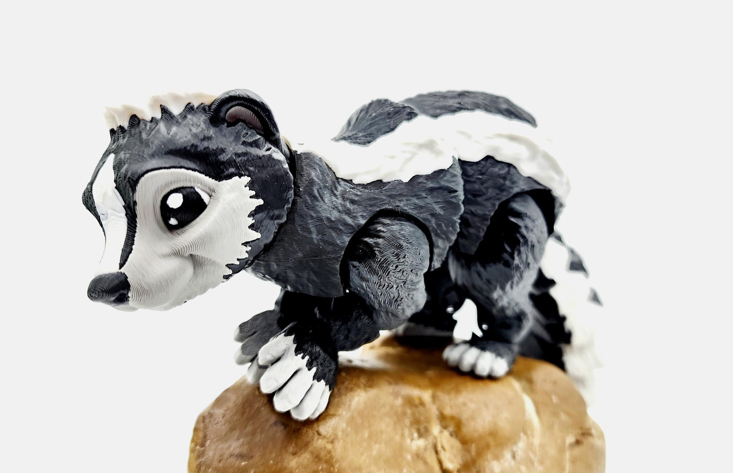 3D printed articulated Racoon fidget, sensory, desktop toy.