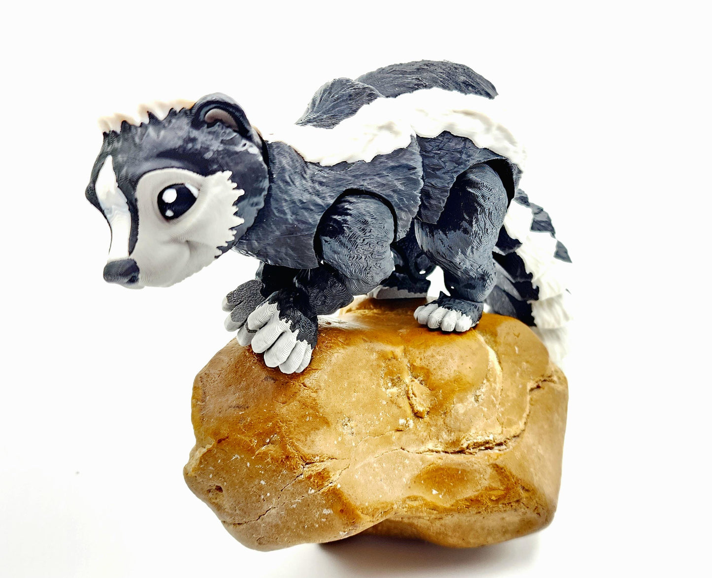 3D printed articulated Racoon fidget, sensory, desktop toy.