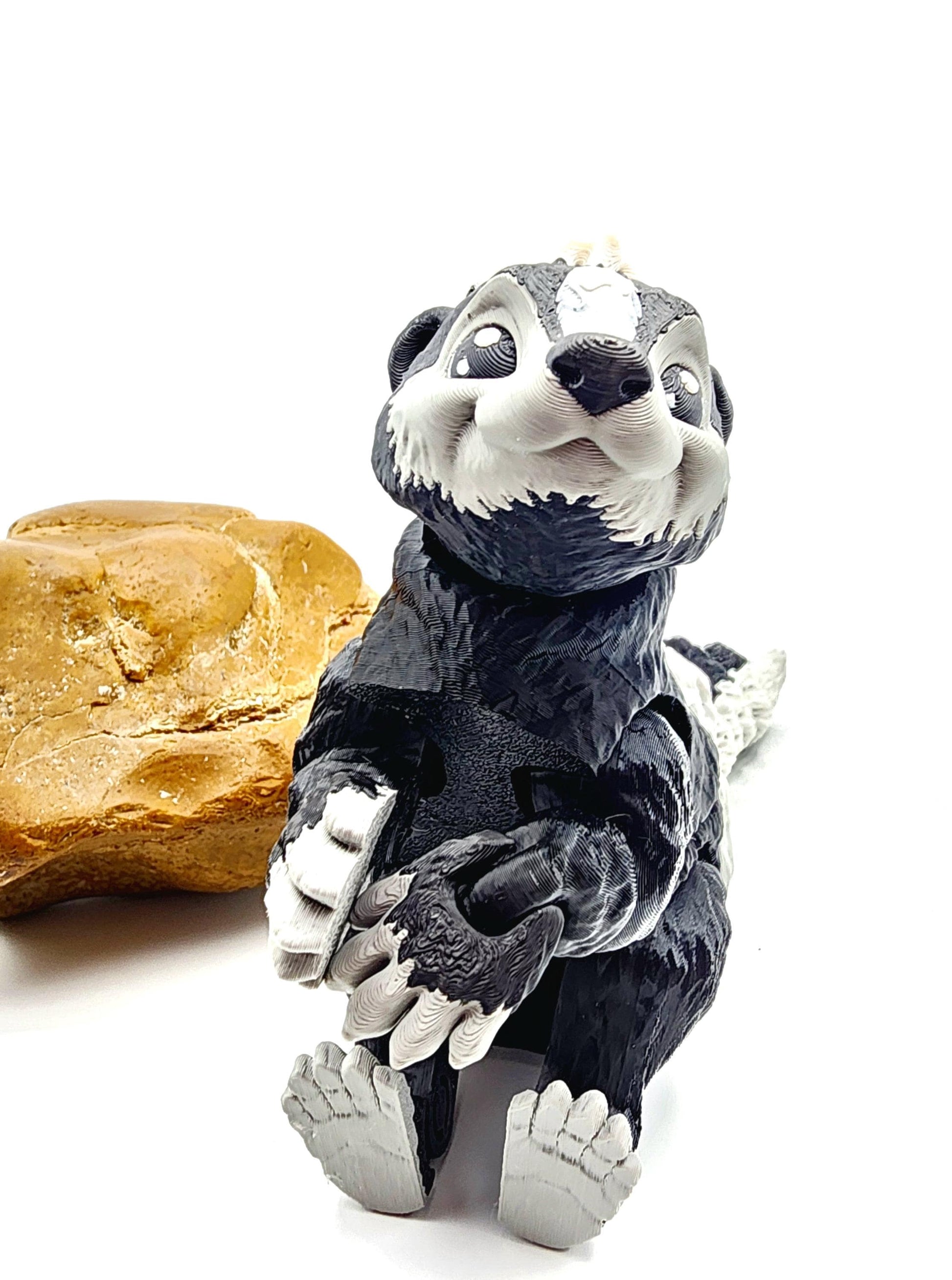 3D printed articulated Racoon fidget, sensory, desktop toy.