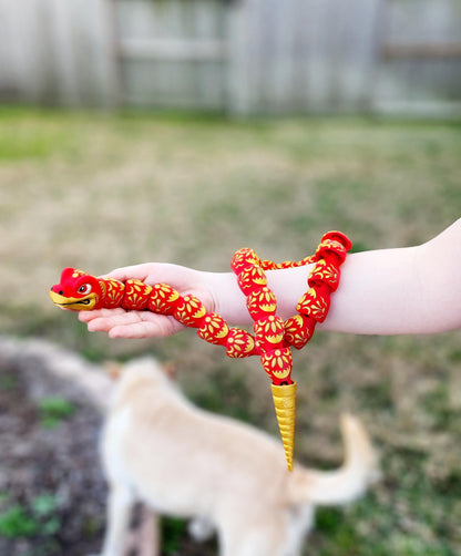 3D printed articulate Year of the Snake fidget, sensory toy.