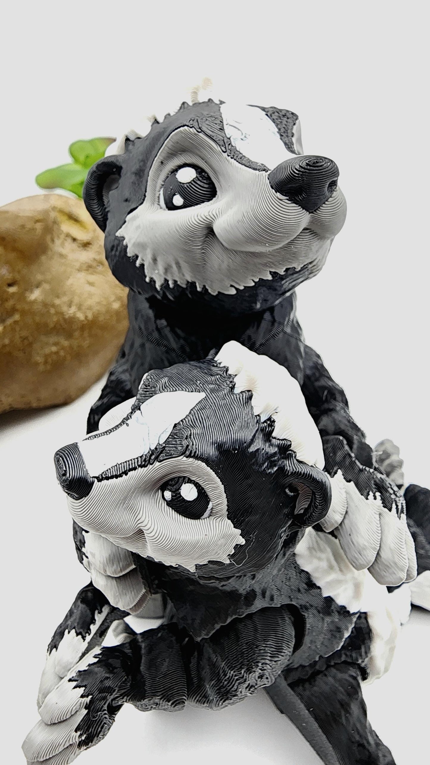 3D printed articulated Racoon fidget, sensory, desktop toy.