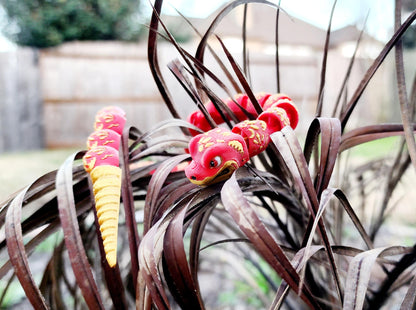 3D printed articulate Year of the Snake fidget, sensory toy.