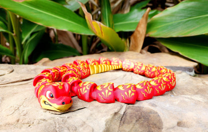 3D printed articulate Year of the Snake fidget, sensory toy.