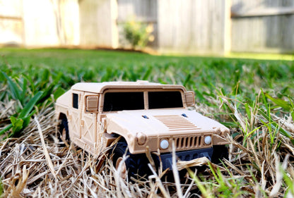 3D printed articulate Humvee action figure, fidget toy.