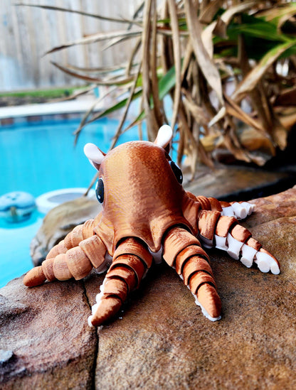 3D printed articulated flapjack octopus fidget, sensory toy.