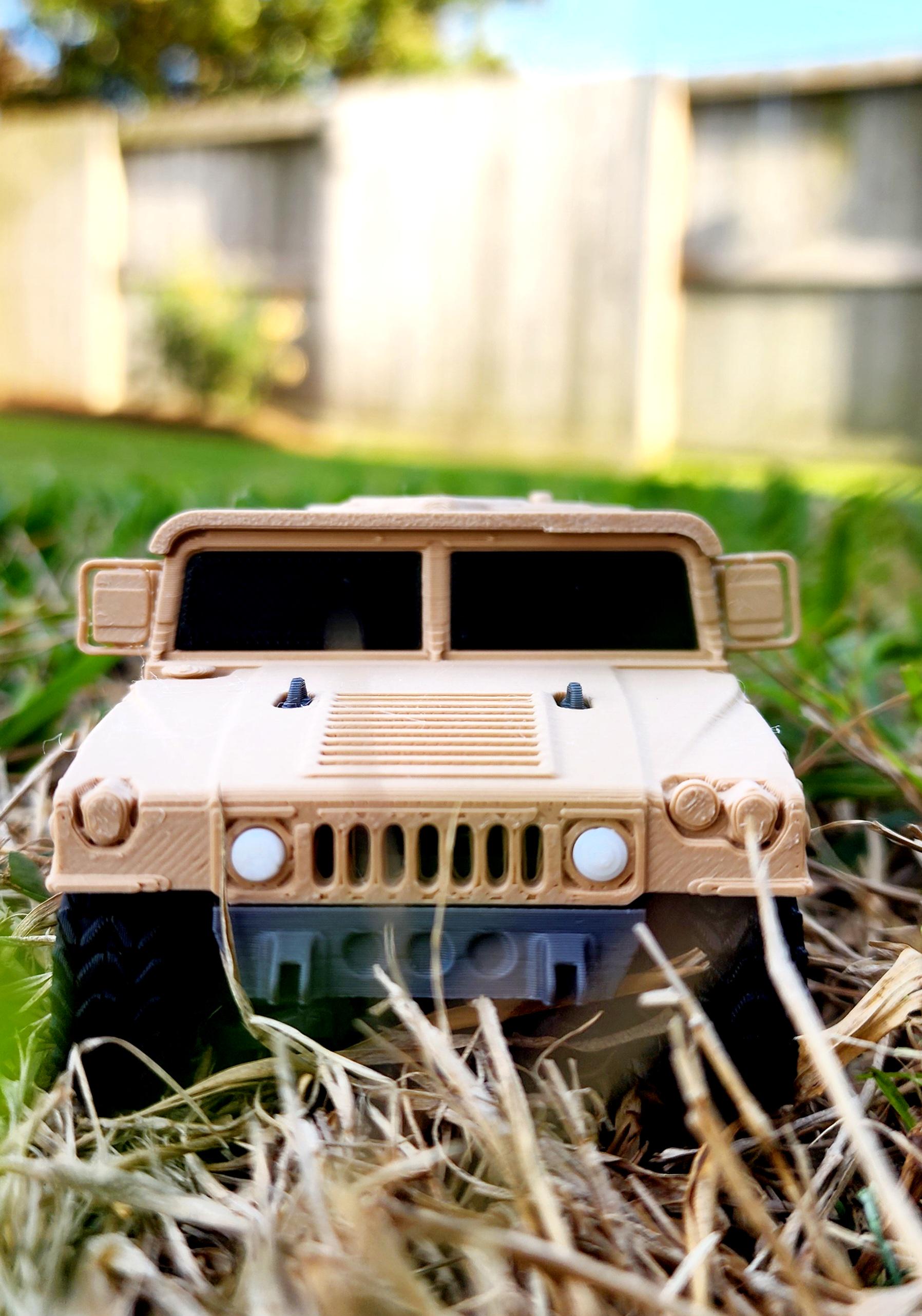 3D printed articulate Humvee action figure, fidget toy.