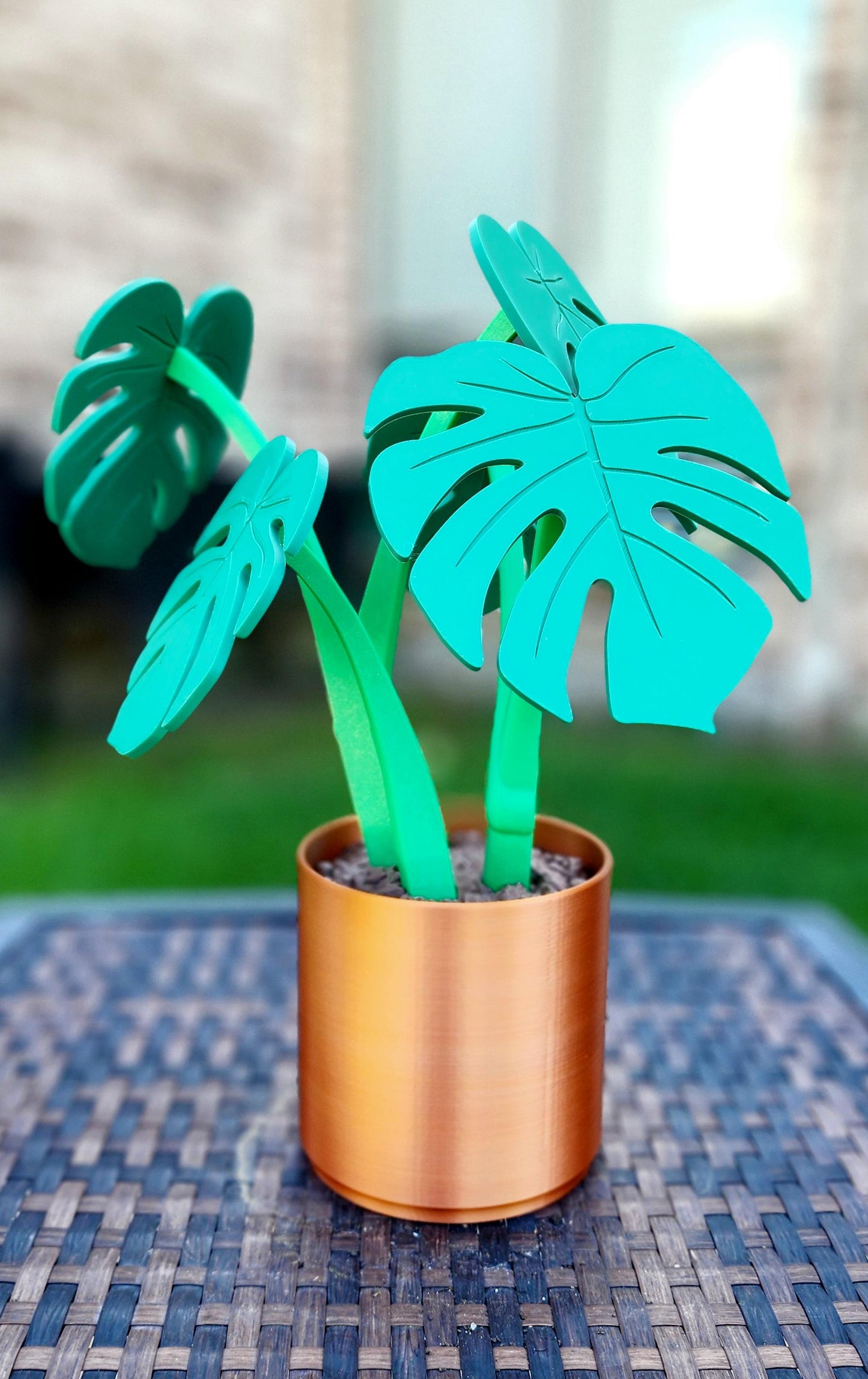 3D printed Monstera Coaster Set with optional armrest table.