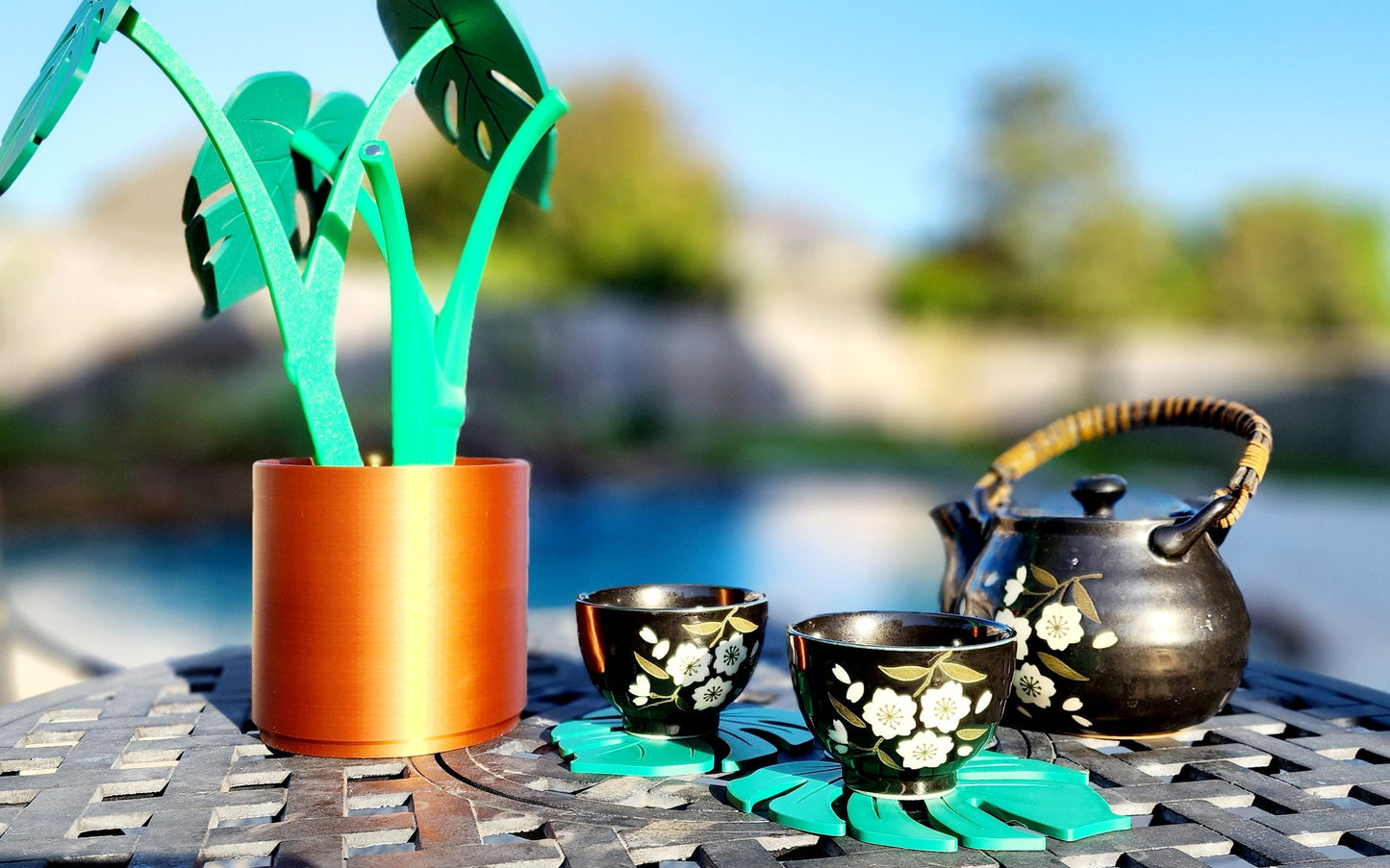 3D printed Monstera Coaster Set with optional armrest table.