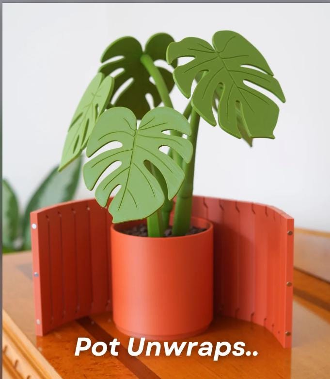 3D printed Monstera Coaster Set with optional armrest table.