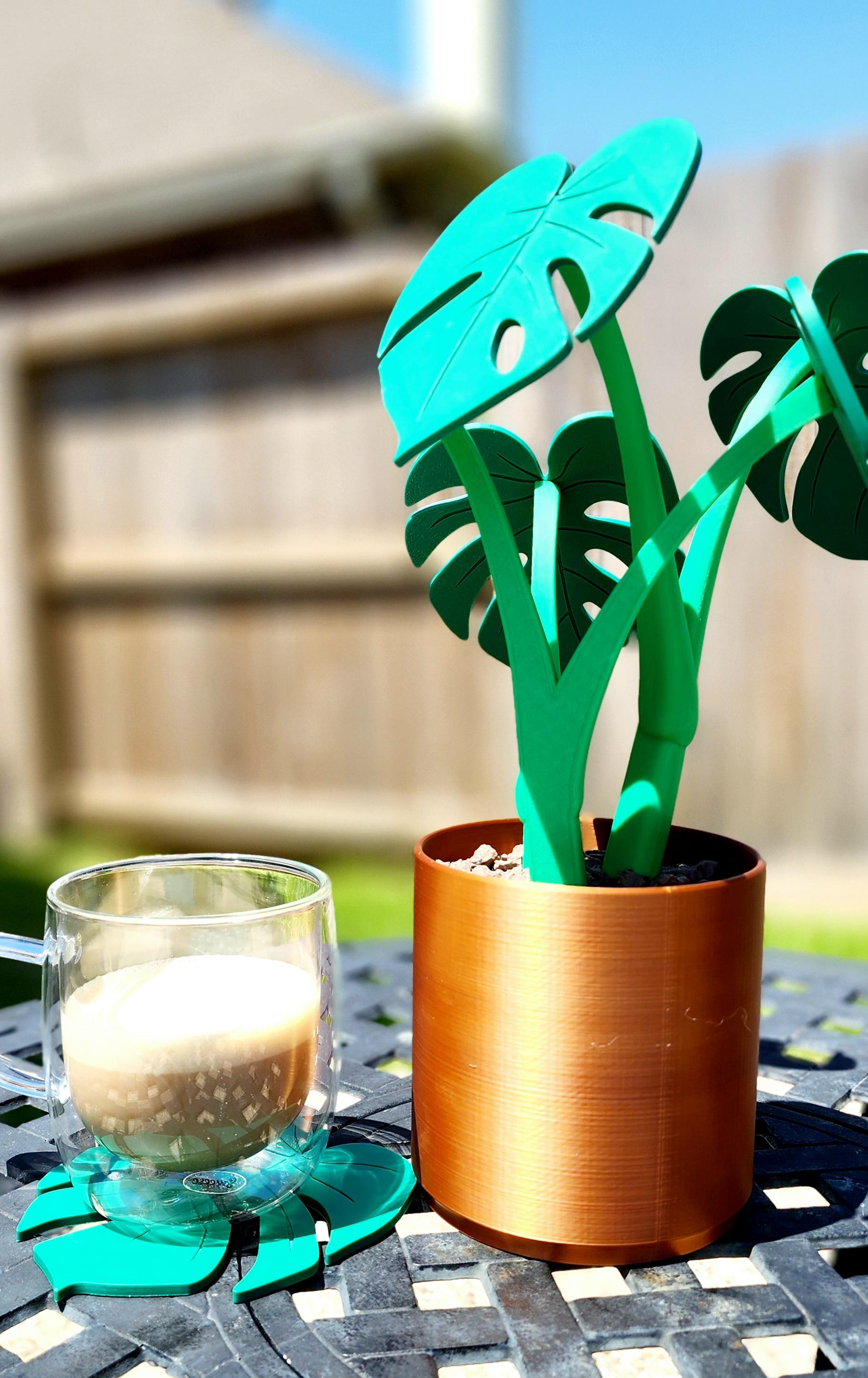 3D printed Monstera Coaster Set with optional armrest table.