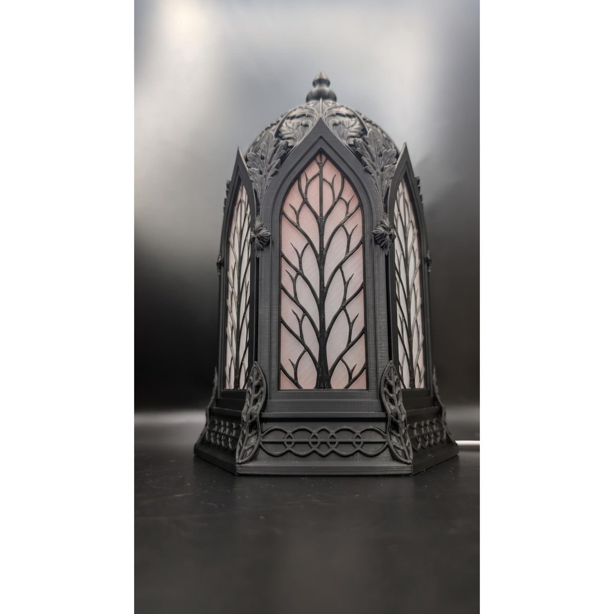 Gothic Cathedral lamp shown in gold, wood, and black finishes